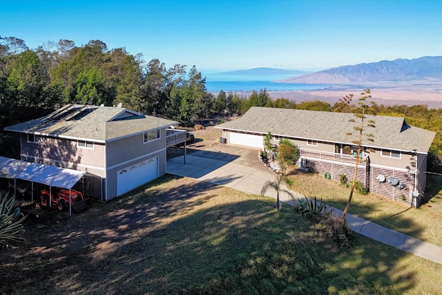 drone / aerial view featuring a mountain view