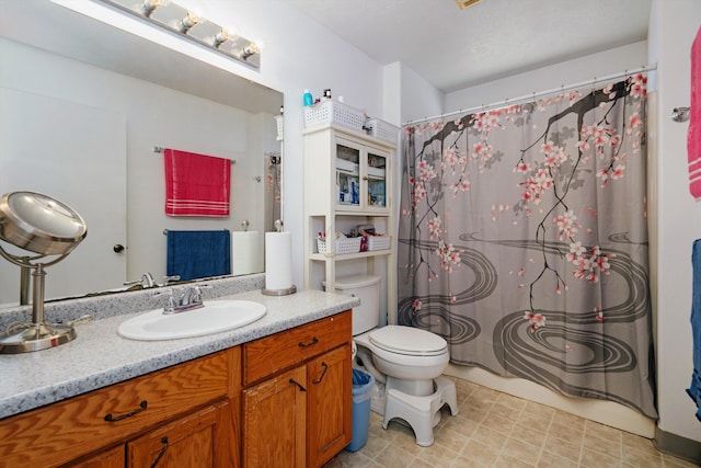 full bathroom with vanity, toilet, and shower / tub combo