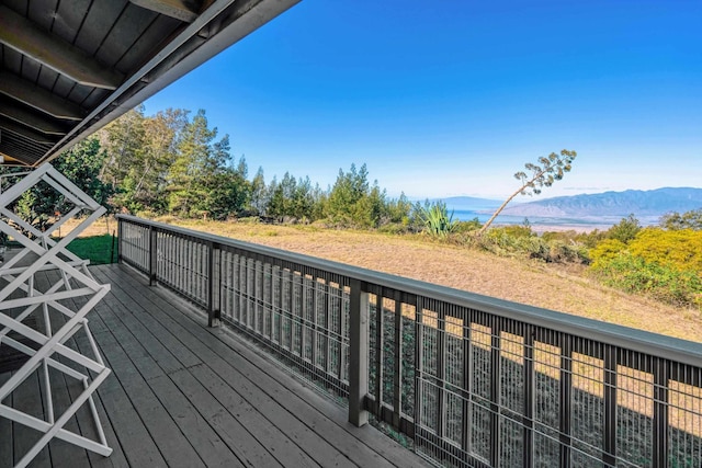 wooden terrace with a mountain view