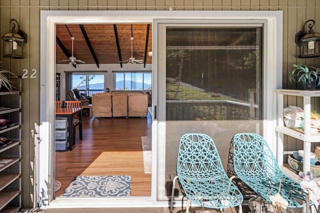 entrance to property with ceiling fan