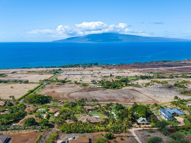 bird's eye view with a water and mountain view