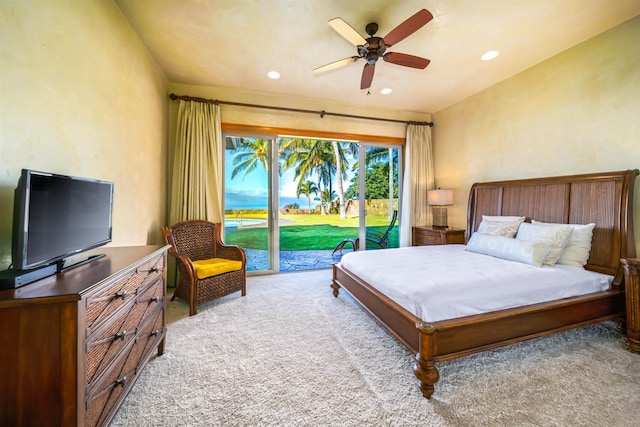 carpeted bedroom featuring access to exterior and ceiling fan