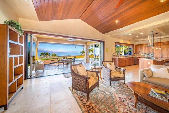 tiled living room featuring wood ceiling and vaulted ceiling