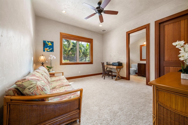 living room featuring ceiling fan and light carpet