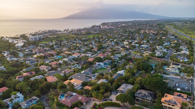 aerial view with a water view and a residential view