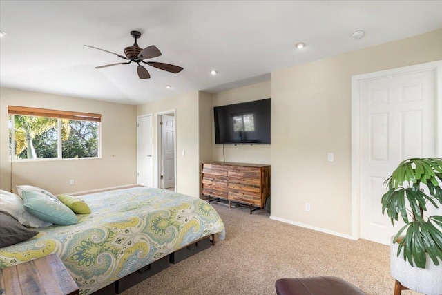 carpeted bedroom with baseboards, ceiling fan, and recessed lighting