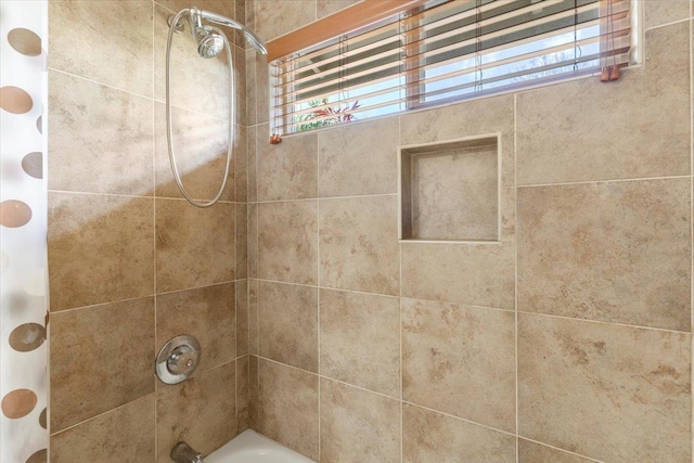 full bathroom with shower / bath combo