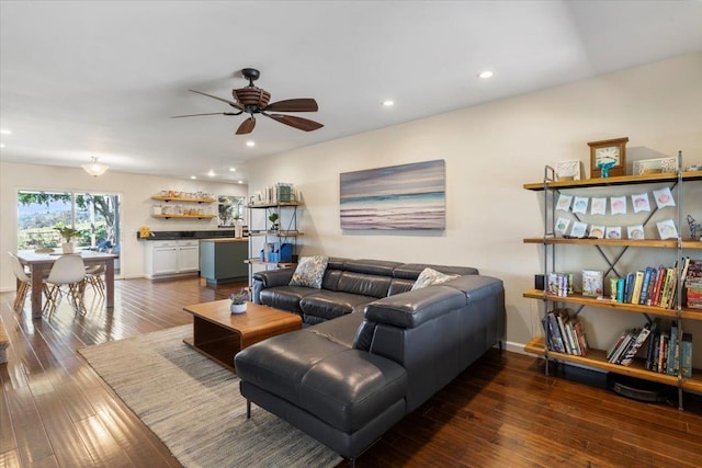 living area featuring recessed lighting, hardwood / wood-style flooring, baseboards, and ceiling fan