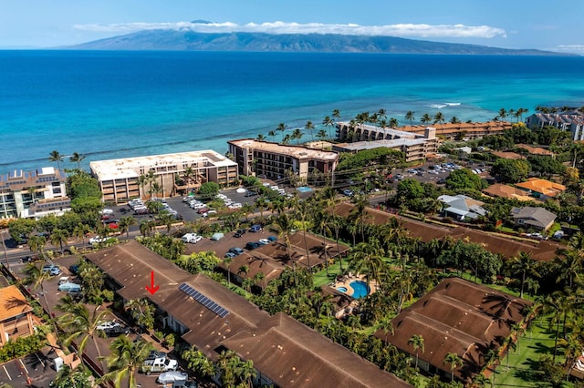 bird's eye view with a water and mountain view