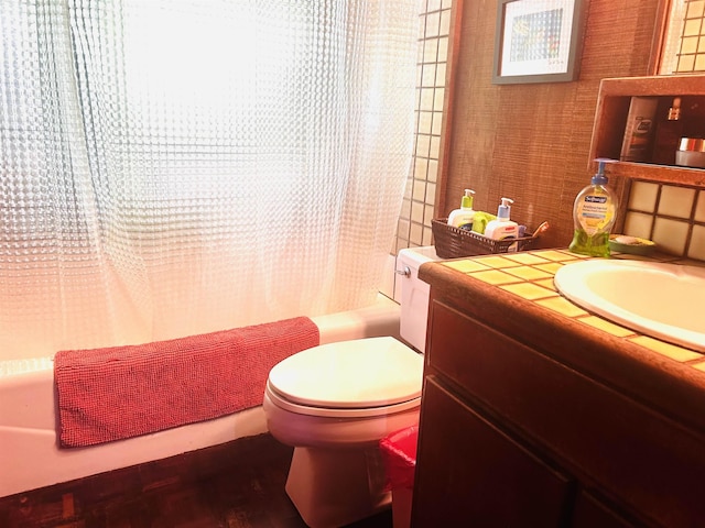 full bathroom with shower / bath combination with curtain, vanity, and toilet