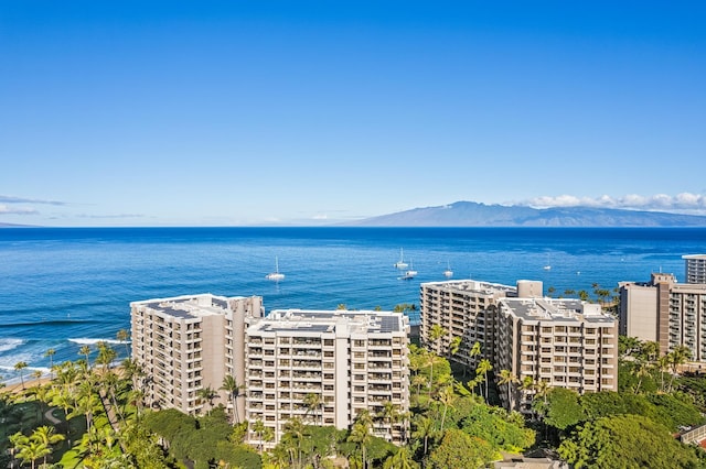 bird's eye view with a water and mountain view