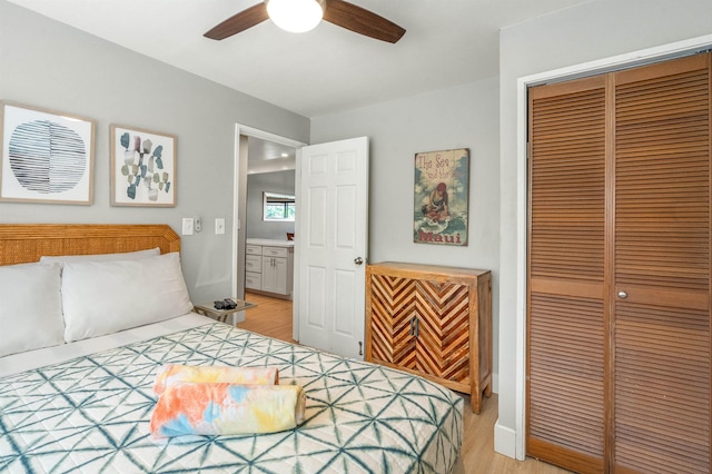 811 S Kihei Rd Unit 2H, Kihei, HI 96753 - bedroom featuring a closet, light wood finished floors, and a ceiling fan