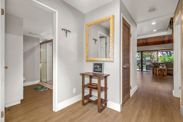 811 S Kihei Rd Unit 2H, Kihei, HI 96753 - corridor featuring baseboards, light wood-style flooring, and recessed lighting