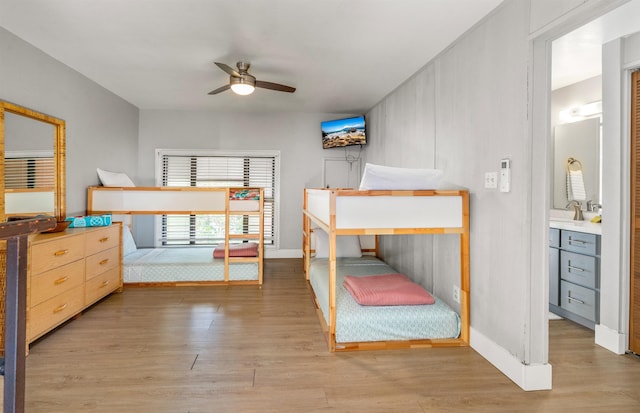 811 S Kihei Rd Unit 2H, Kihei, HI 96753 - bedroom featuring wood finished floors and baseboards