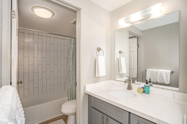 811 S Kihei Rd Unit 2H, Kihei, HI 96753 - bathroom featuring vanity, toilet, and shower / bath combination with curtain
