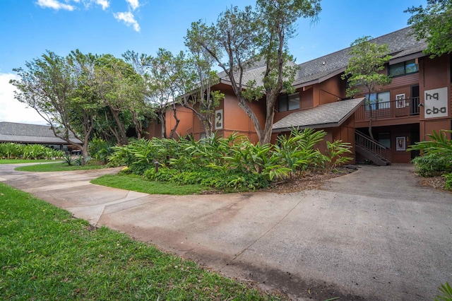 811 S Kihei Rd Unit 2H, Kihei, HI 96753 - view of building exterior featuring stairway