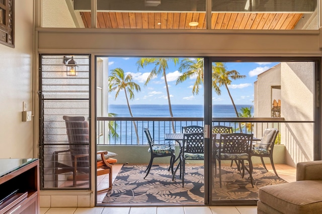 sunroom with a water view