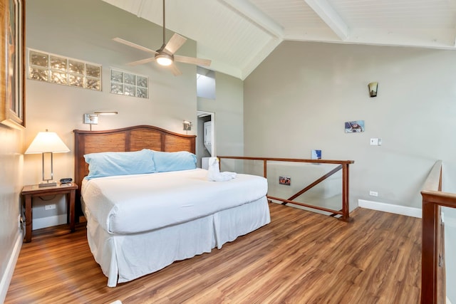 bedroom with beam ceiling, ceiling fan, high vaulted ceiling, and hardwood / wood-style flooring