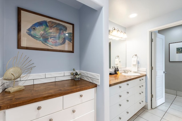 bathroom featuring vanity and tile patterned floors