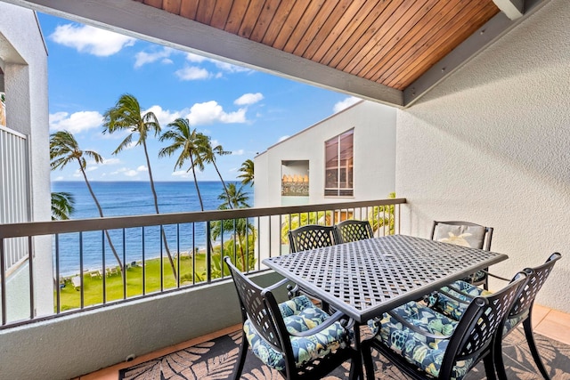 balcony featuring a water view