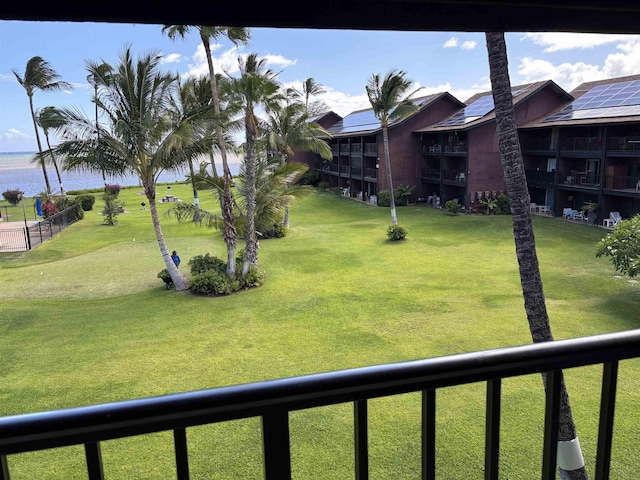 1000 Kam V Hwy Unit 320B, Kaunakakai, HI 96748 - view of yard with a water view and a balcony