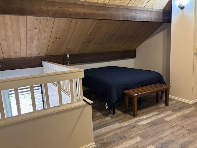 1000 Kam V Hwy Unit 320B, Kaunakakai, HI 96748 - bedroom with wood finished floors, baseboards, and wooden ceiling with exposed beams