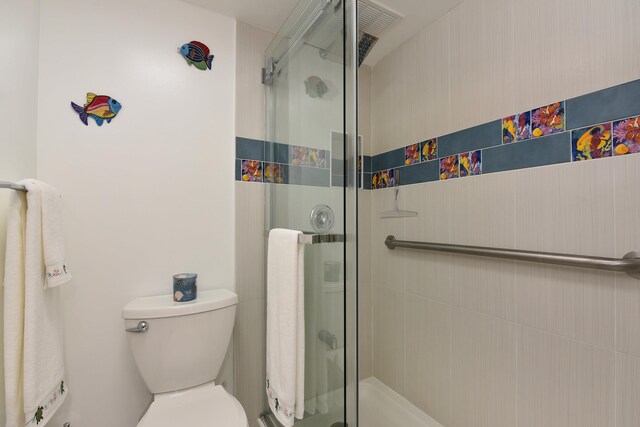 4327 Lower Honoapiilani Rd Unit 207B, Lahaina, HI 96761 - bathroom with toilet and a shower with door