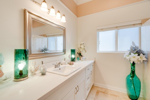 bathroom with vanity and a healthy amount of sunlight