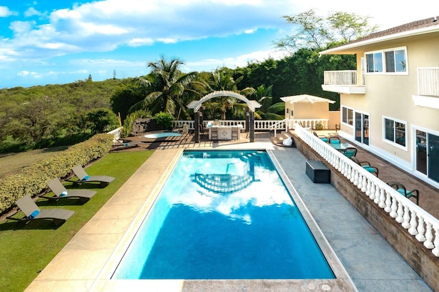 view of pool featuring a patio