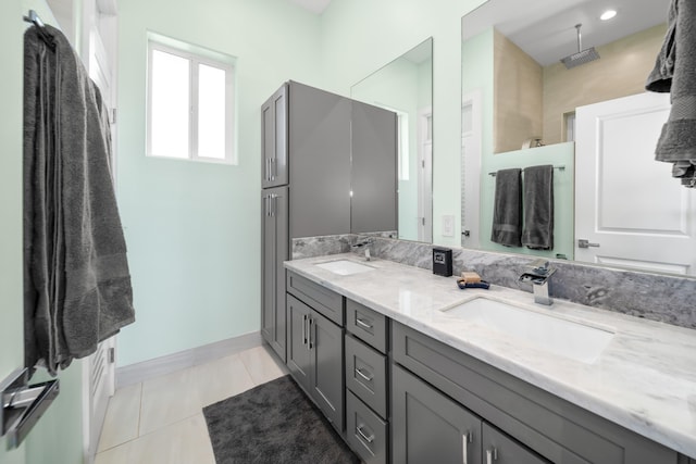 bathroom with vanity and tile patterned floors