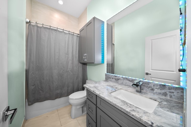 full bathroom with tile patterned floors, vanity, toilet, and shower / tub combo