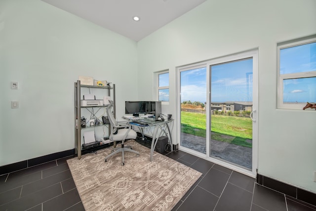 office space featuring dark tile patterned flooring