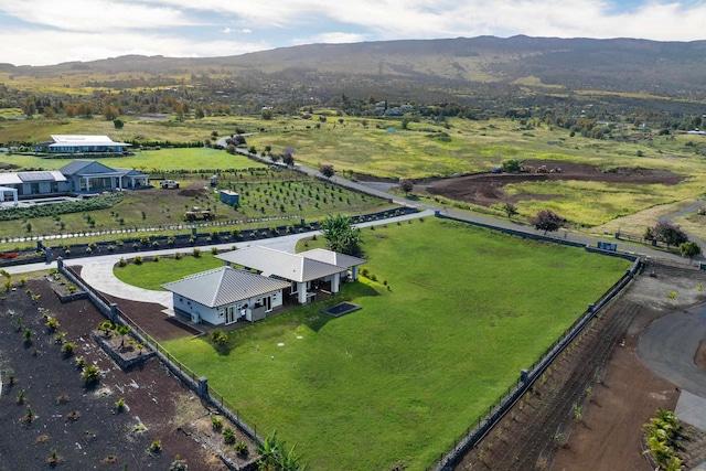 aerial view featuring a mountain view and a rural view