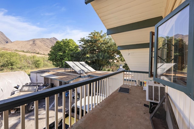 balcony featuring a mountain view