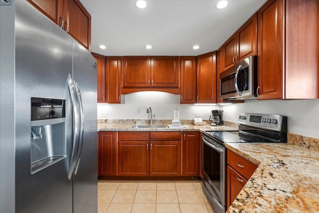 3445 Lower Honoapiilani Rd Unit 204, Lahaina, HI 96761 - kitchen with appliances with stainless steel finishes, a sink, light stone countertops, light tile patterned floors, and recessed lighting