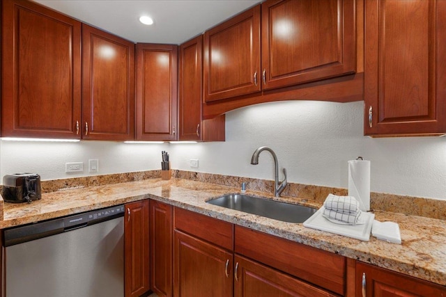 3445 Lower Honoapiilani Rd Unit 204, Lahaina, HI 96761 - kitchen with stainless steel dishwasher, a sink, light stone countertops, and a textured wall