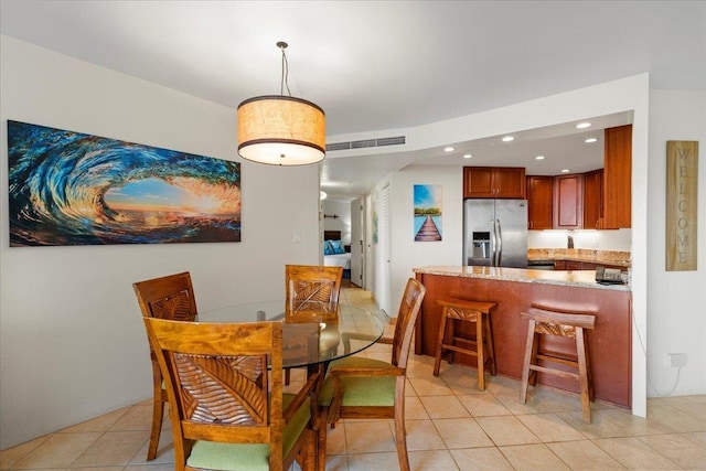 3445 Lower Honoapiilani Rd Unit 204, Lahaina, HI 96761 - dining room featuring light tile patterned floors and recessed lighting