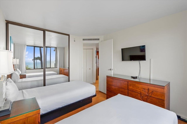 3445 Lower Honoapiilani Rd Unit 204, Lahaina, HI 96761 - bedroom with light wood-style flooring