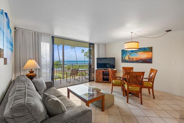 3445 Lower Honoapiilani Rd Unit 204, Lahaina, HI 96761 - living area featuring light tile patterned flooring and a wall of windows