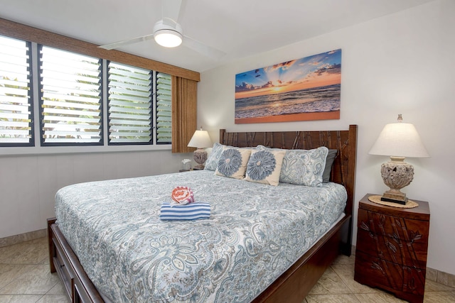 bedroom featuring ceiling fan and light tile flooring