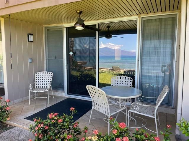 view of patio / terrace featuring a water view