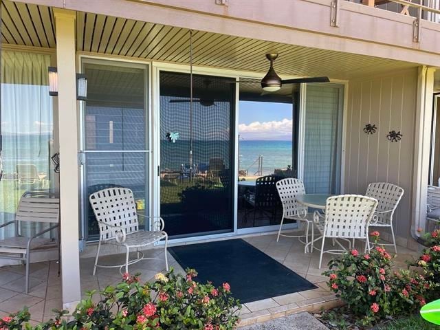 view of patio / terrace with a water view