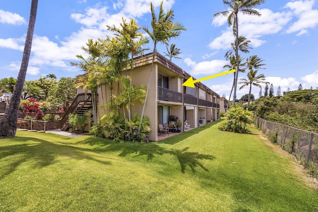 120 Hui Rd F E16, Lahaina, HI 96761 - back of house with stairs, a patio area, a balcony, and stucco siding