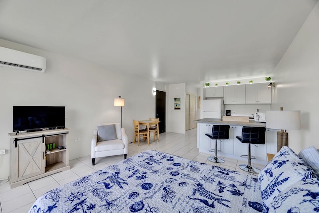 120 Hui Rd F E16, Lahaina, HI 96761 - living area featuring light tile patterned flooring and a wall mounted AC