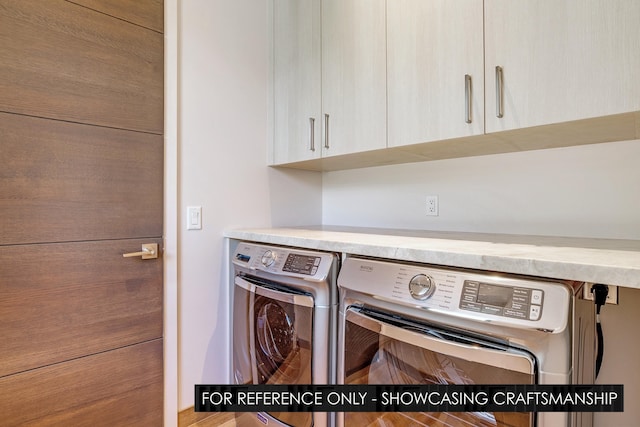 laundry area featuring cabinet space and independent washer and dryer