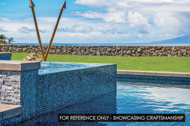 outdoor pool with a yard