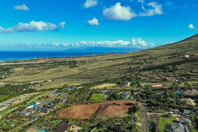 aerial overview of property's location with a nearby body of water