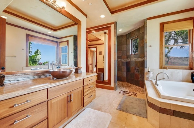 bathroom with a raised ceiling, vanity, tile patterned floors, and plus walk in shower