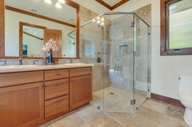 bathroom with a shower with shower door, toilet, and vanity