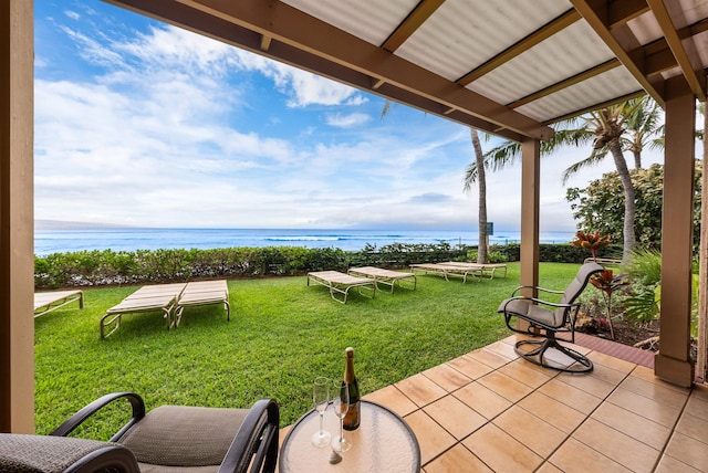 view of patio / terrace with a water view